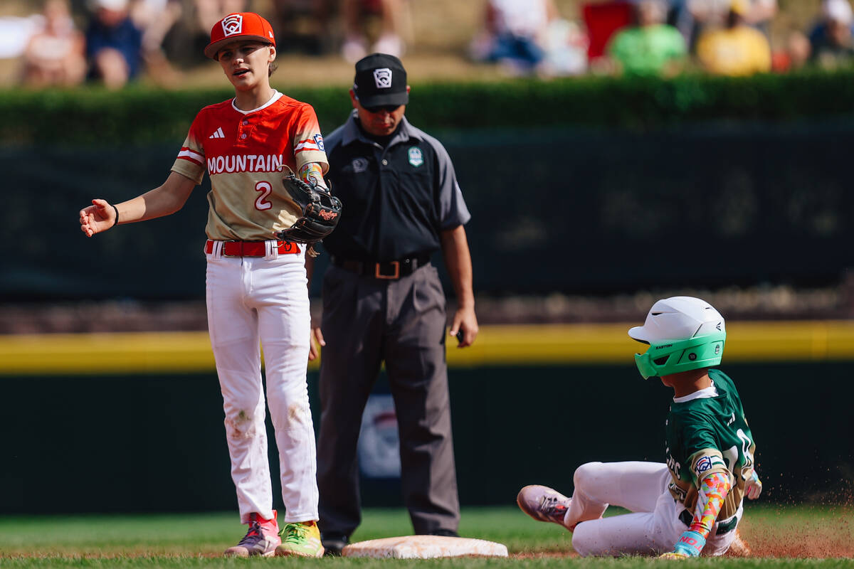 Summerlin South second baseman Ethan Robertson (2) gestures as Tung-Yuan pitcher Chu Tzu-Ching ...