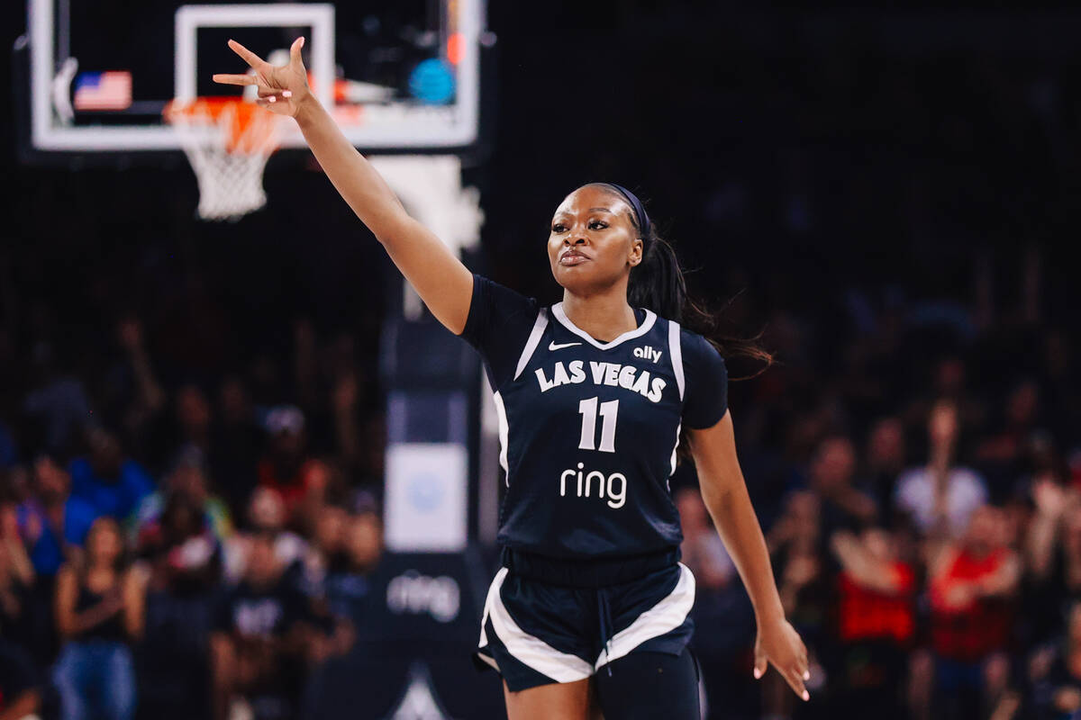 Aces guard Dana Evans (11) celebrates a shot during a WNBA basketball game between the Aces and ...