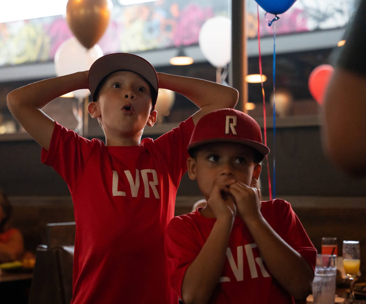 LVR players Ryland Wohlgemuth, left, and Braxton White, right, react to a play while watching S ...