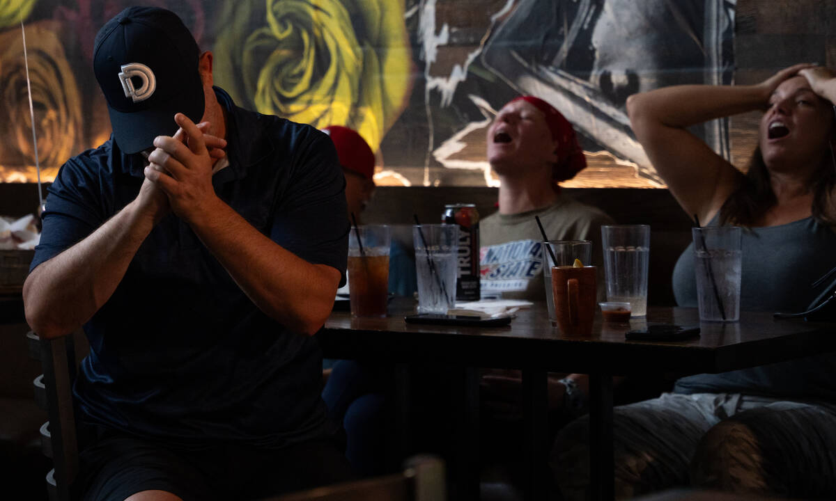 Local Little League parent Travis Bird reacts near the end of Summerlin South’s game against ...