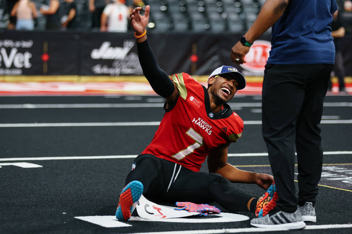 Knight Hawks wide receiver CJ Windham Jr. (7) celebrates winning the Indoor Football League&#x2 ...