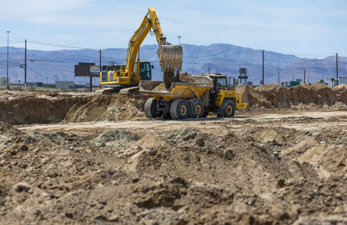 Soil is scraped and hauled as grading work continues on Brightline West's land on Wednesday, Au ...