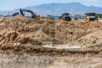 Soil is scraped and hauled as grading work continues on Brightline West's land on Wednesday, Au ...