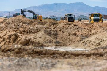 Soil is scraped and hauled as grading work continues on Brightline West's land on Wednesday, Au ...