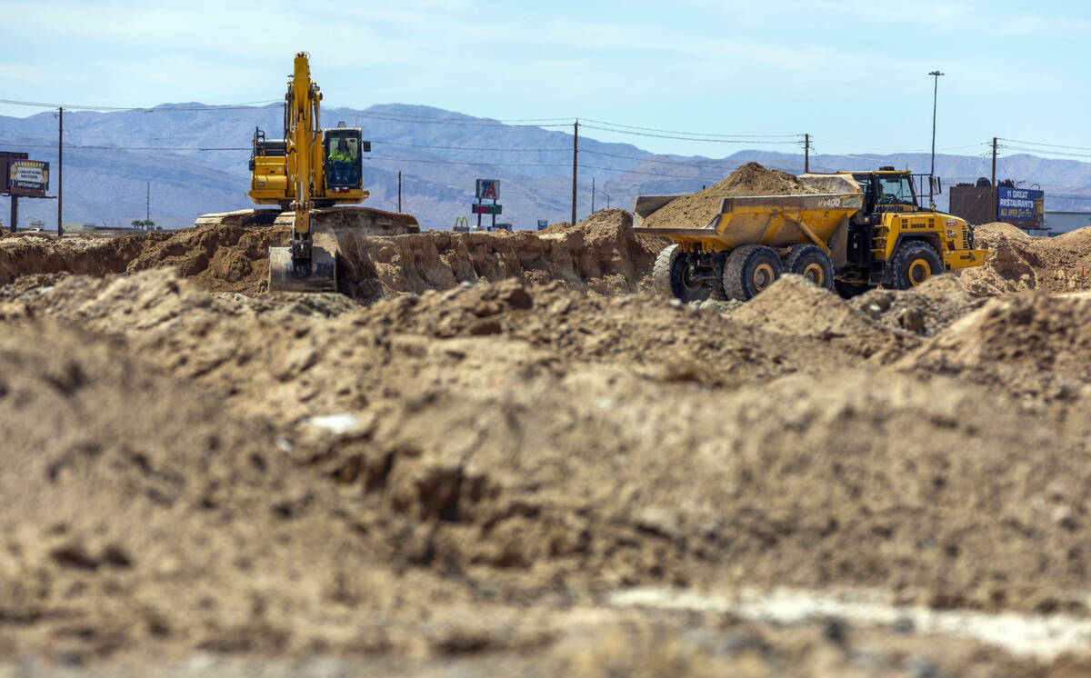 Soil is scraped and hauled as grading work continues on Brightline West's land on Wednesday, Au ...