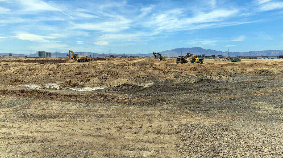 Soil is scraped and hauled as grading work continues on Brightline West's land on Wednesday, Au ...