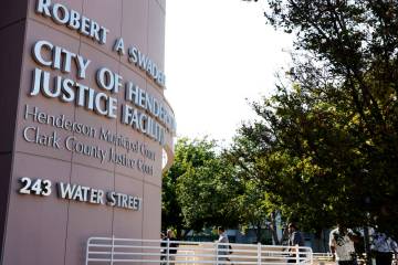 People enter City of Henderson Justice Facility building where Henderson Municipal and Clark Co ...