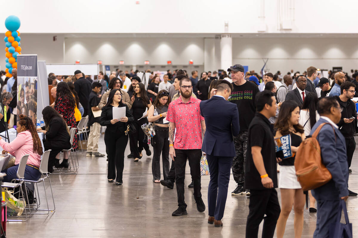 Attendees explore the spring job fair at the Las Vegas Convention Center on Thursday, May 1, 20 ...