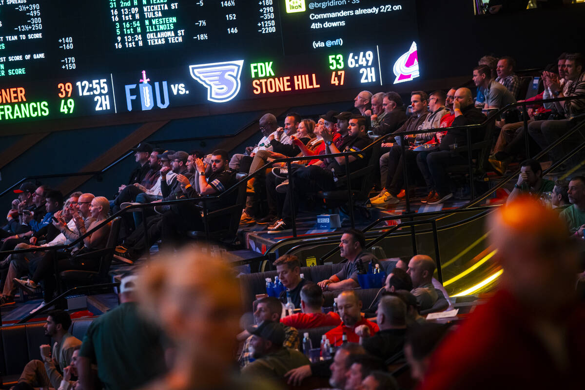 People watch the NFC championship football game between the Philadelphia Eagles and Washington ...