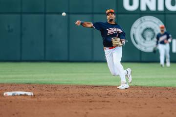 Aviators infielder Darell Hernaiz (2) throws the ball during a baseball game between the Las Ve ...