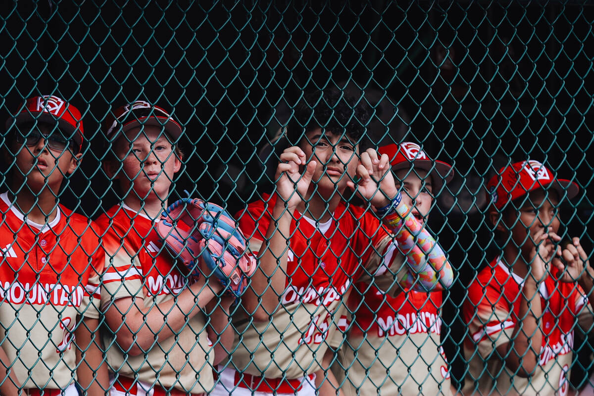 Summerlin South teammates watch game action from the dugout during a Little League World Series ...