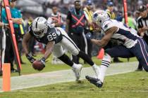 Oakland Raiders wide receiver Amari Cooper (89) dives for a touchdown against New England Patri ...
