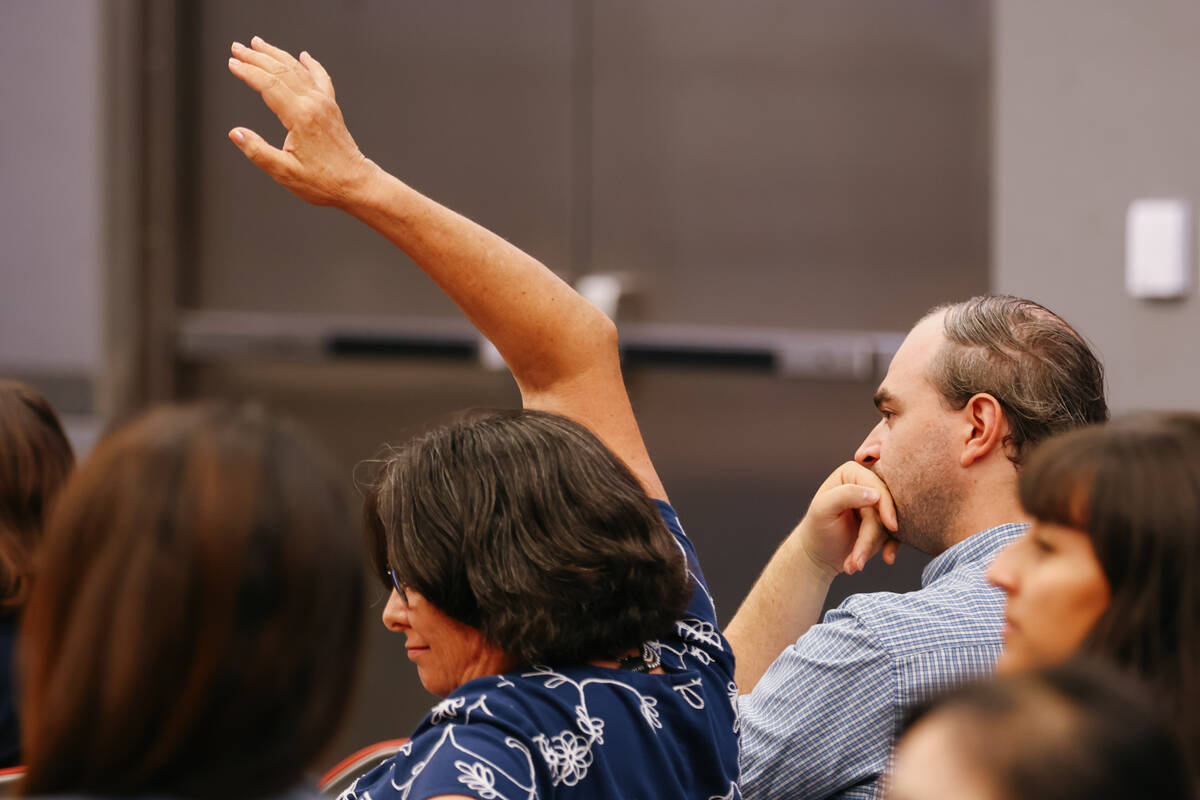 Janet Carter, Vice Chapter Chair for the Sierra Club’s Toiyabe Chapter, raises her hand ...