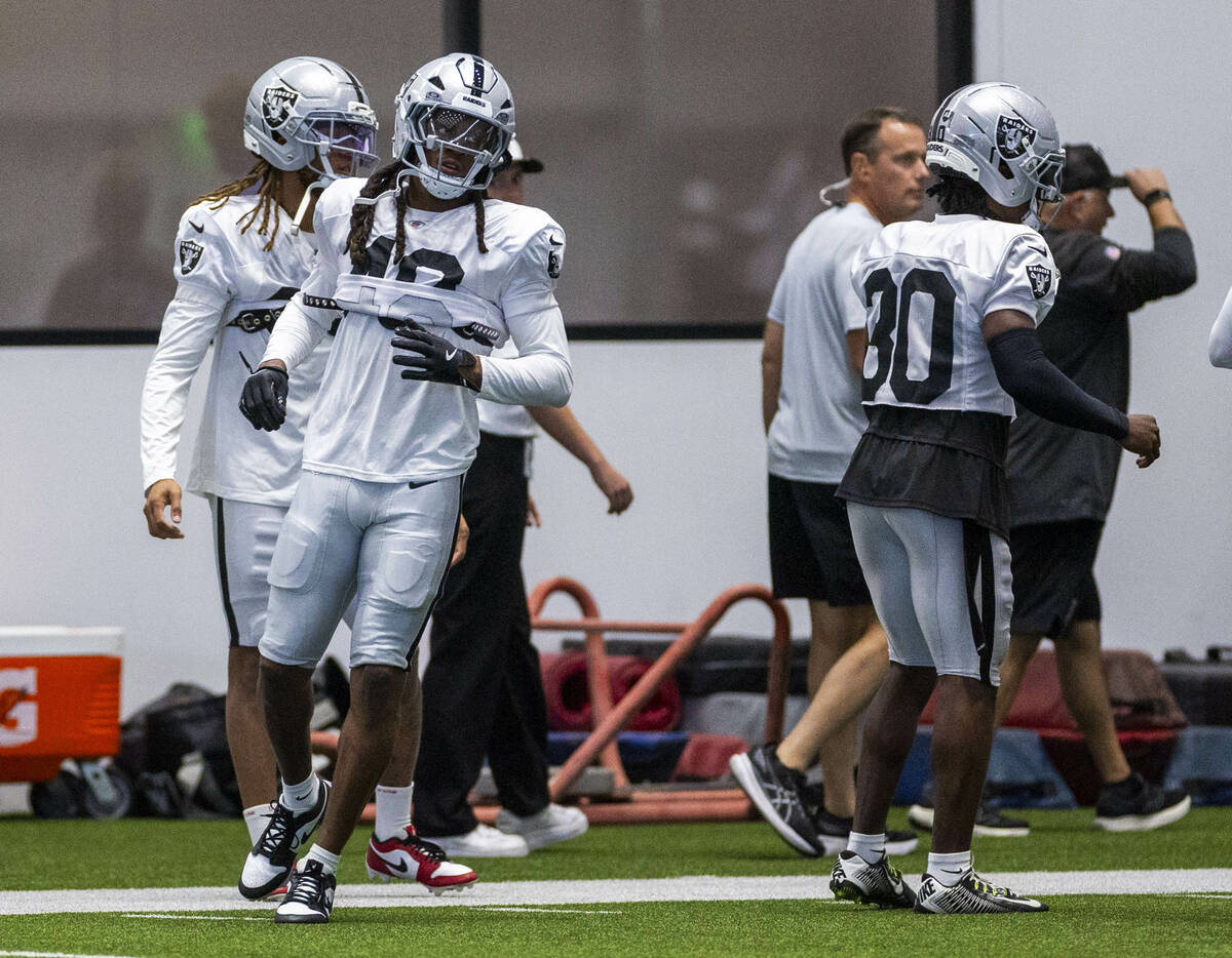 Raiders safety Terrell Edmunds (48) warms up with teammates during training camp at the Intermo ...