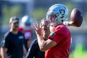 Raiders quarterback Cam Miller (5) looks to a receiver during practice at the Intermountain Hea ...