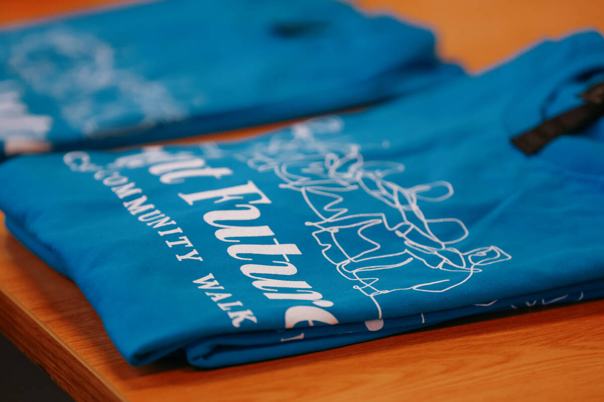 T-shirts sit out for volunteers during the Bright Futures Walk on Tuesday, Aug. 26, 2025 in Las ...