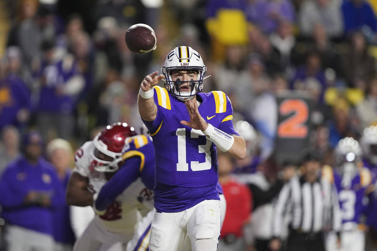 FILE - LSU quarterback Garrett Nussmeier (13) throws a pass in the first half an NCAA college f ...