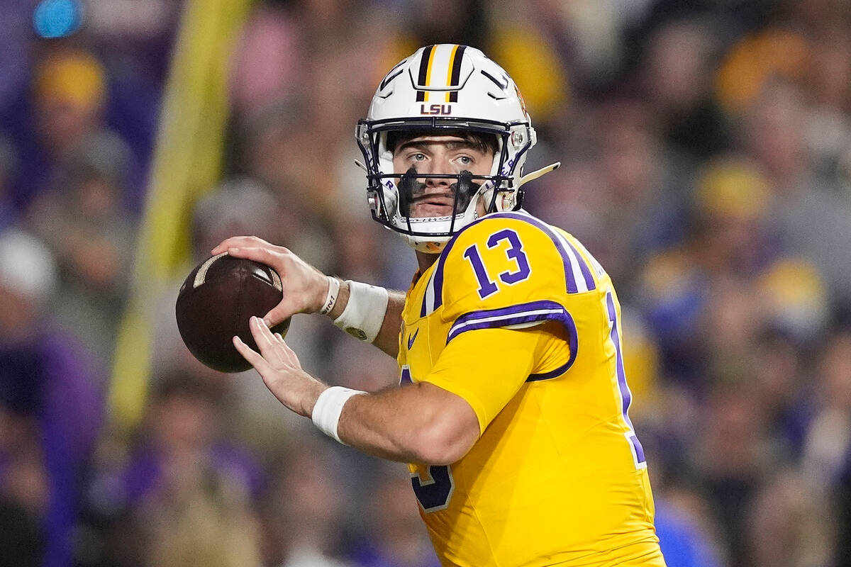 FILE - LSU quarterback Garrett Nussmeier (13) throws a pass in the first half of an NCAA colleg ...