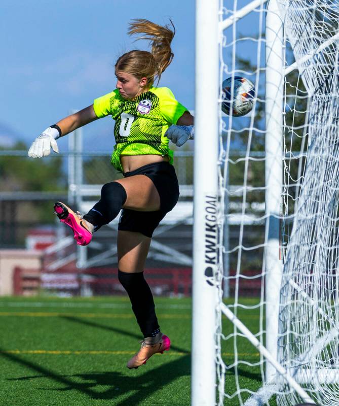 Coronado goalkeeper Liliana Foss (0) has a ball deflected of the post and herself for a Faith L ...