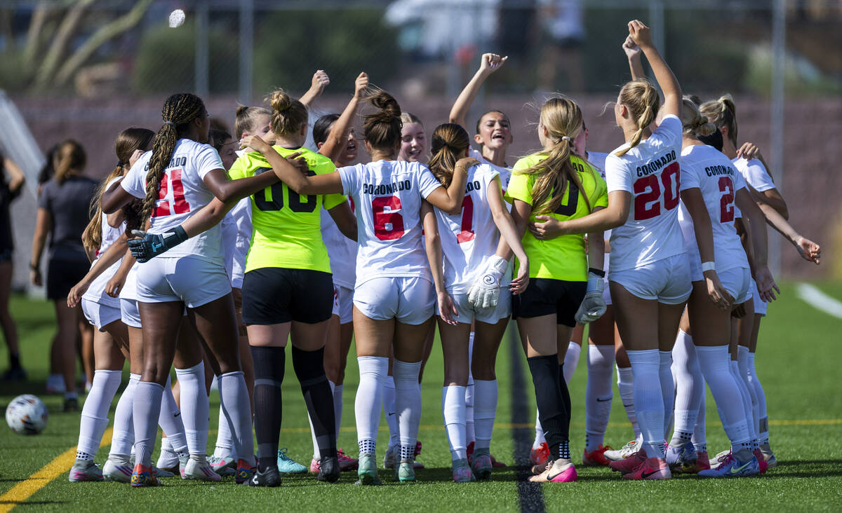 Coronado players huddle as they ready to battle Faith Lutheran during the first half of their N ...