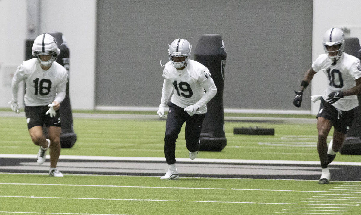 Raiders wide receivers Jack Bech (18), Amari Cooper (19) and Dont’e Thornton (10) run du ...