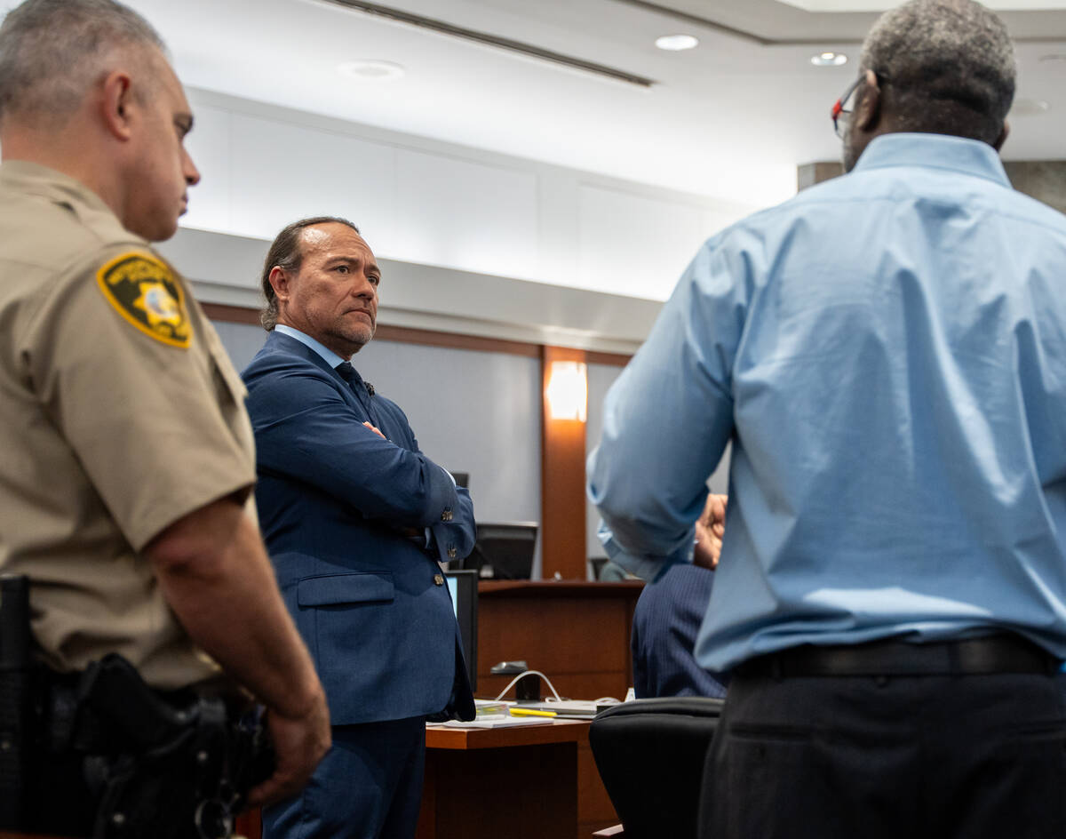 Nathan Williams argues about his defense with his attorney Michael Sanft in Las Vegas on Aug. 2 ...