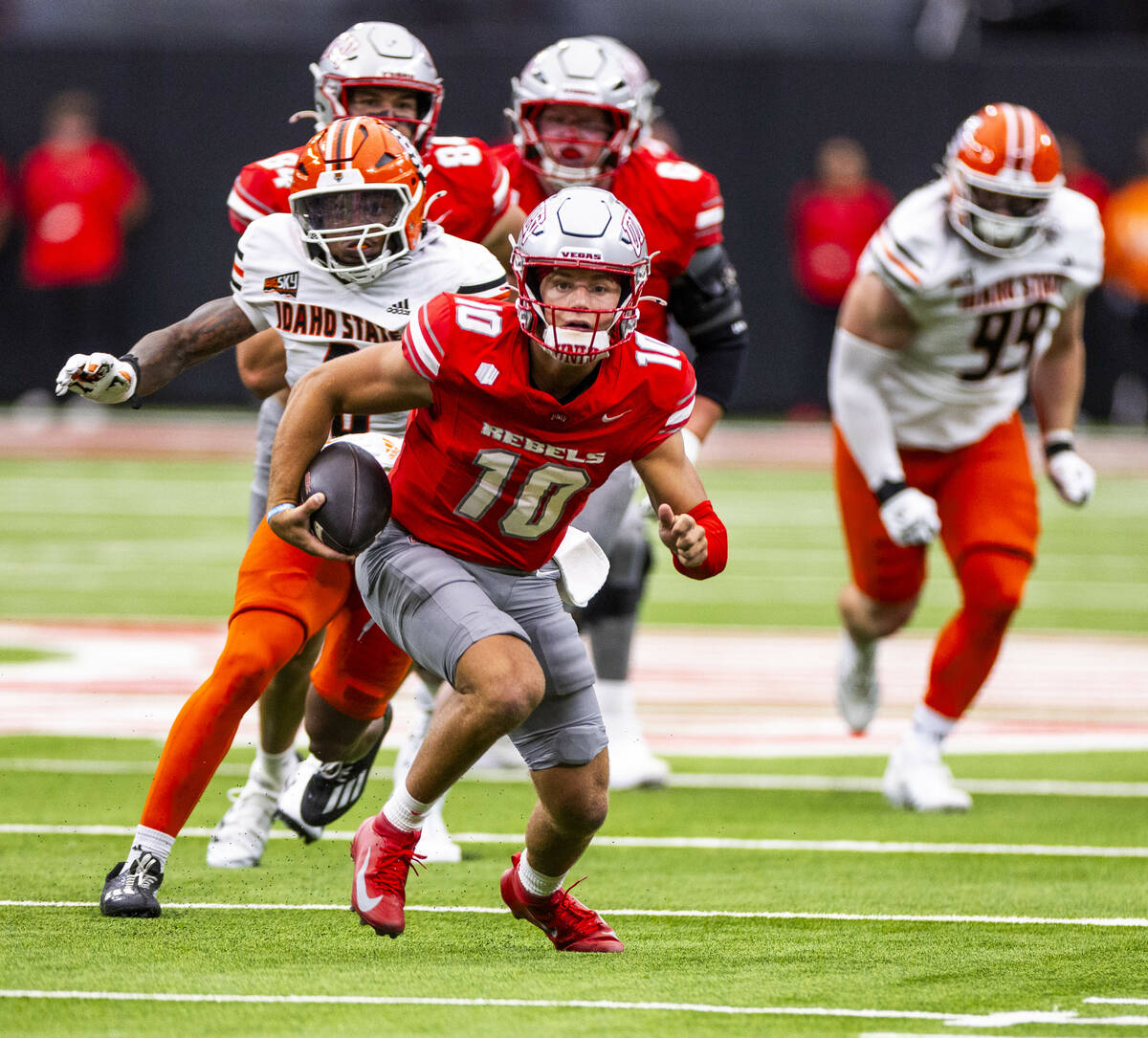 UNLV quarterback Anthony Colandrea (10) breaks free for a long run against the Idaho State Beng ...