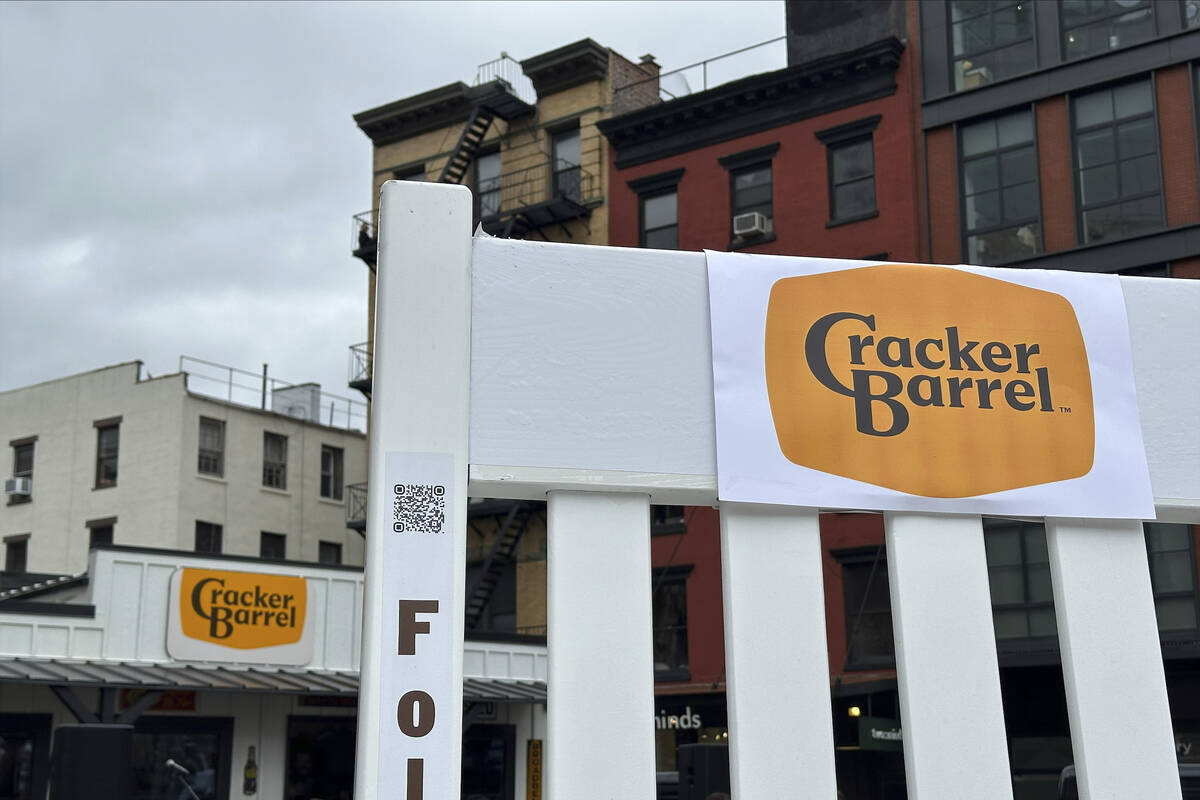 The new Cracker Barrel logo is displayed on Thursday, Aug. 21, 2025, in New York. (AP Photo/Wya ...
