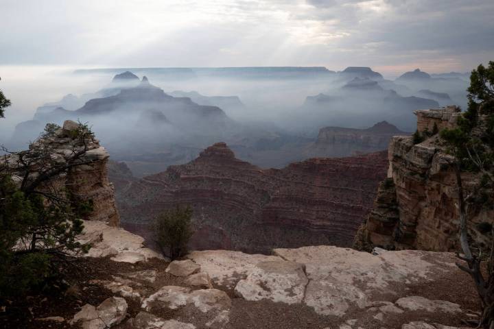 Smoke from the Dragon Bravo fire settles into the Grand Canyon along the South Rim near Mather ...