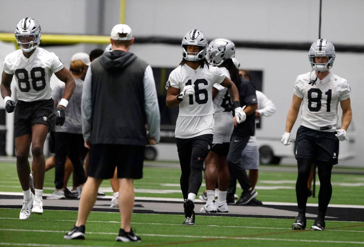 Raiders tight end Justin Shorter (88) wide receivers Jakobi Meyers (16) and Alex Bachman (81) w ...