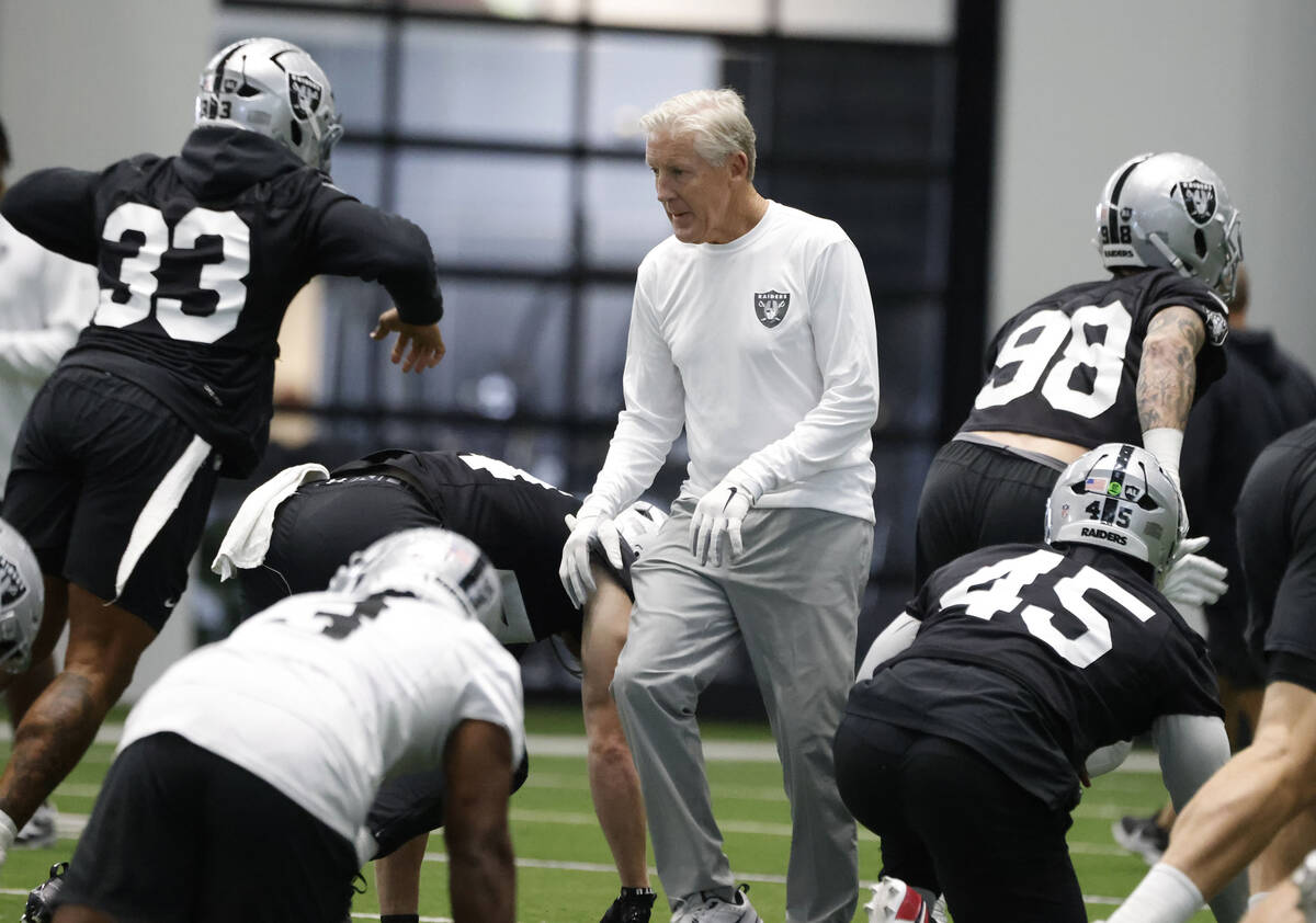 Raiders head coach Pete Carroll walks through team practice at the Intermountain Health Perform ...