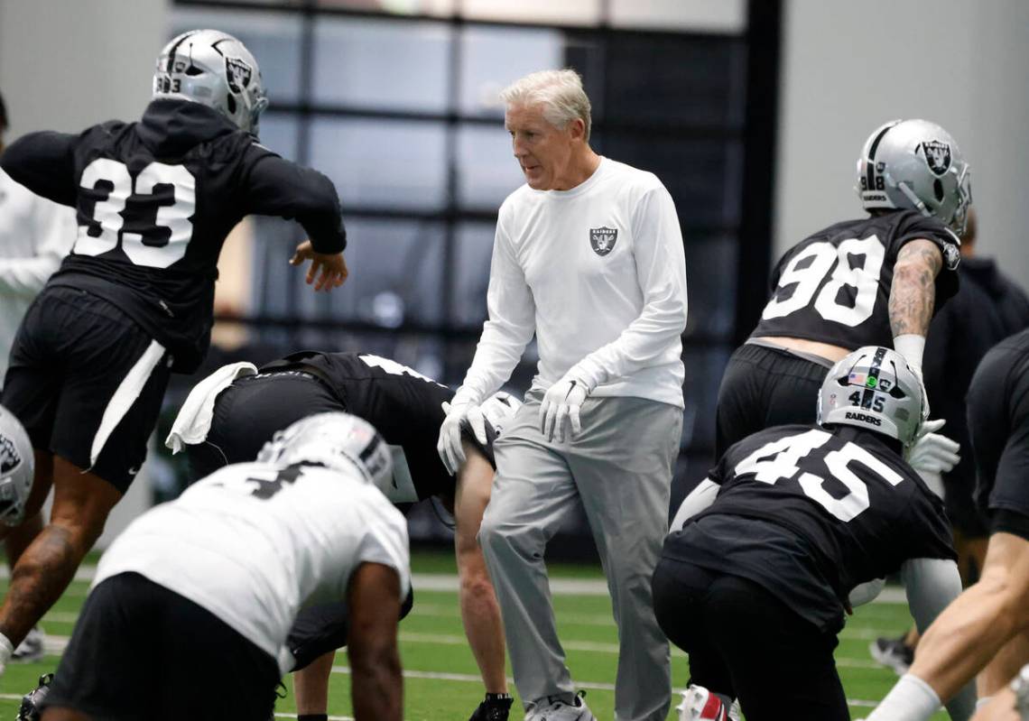 Raiders head coach Pete Carroll walks through team practice at the Intermountain Health Perform ...