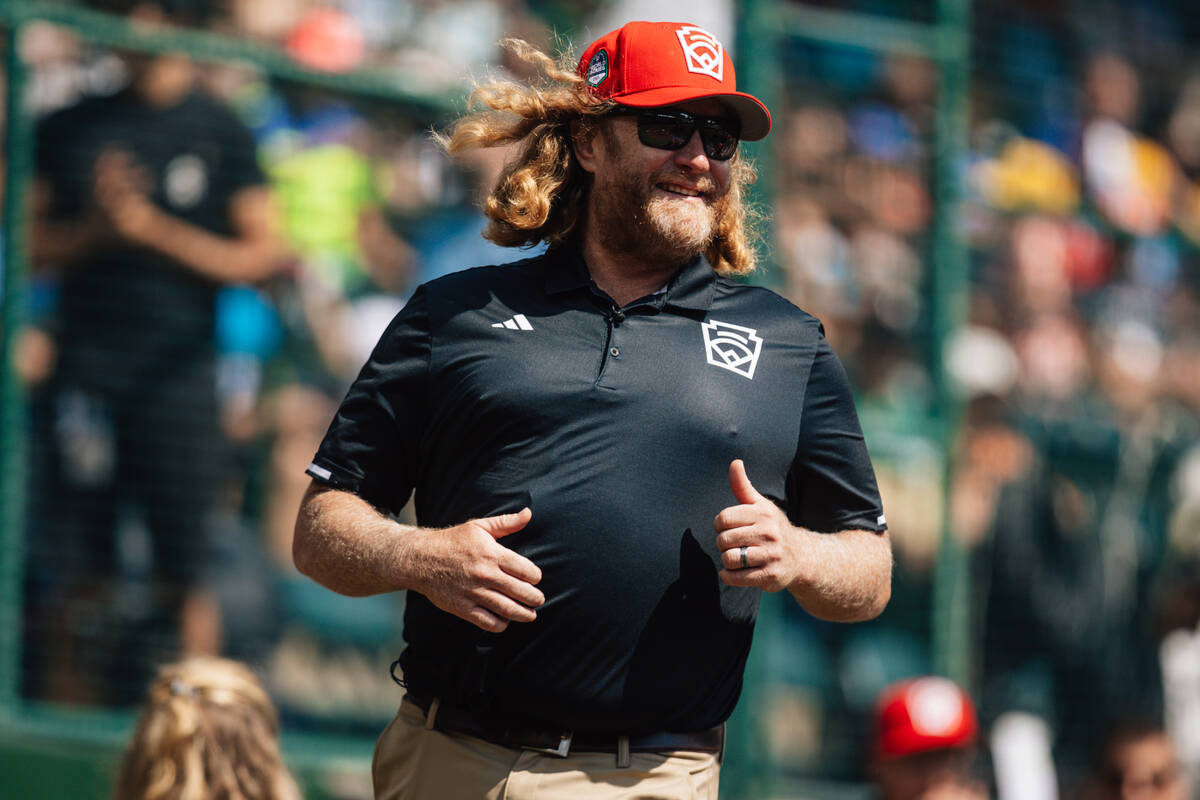 Summerlin South head coach TJ Fechser smiles before a Little League World Series world champion ...