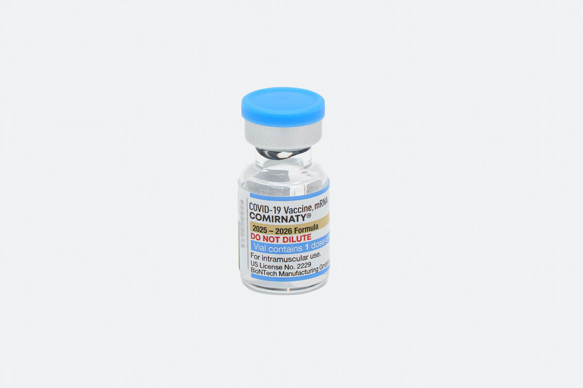 This photo provided by Pfizer in August 2025 shows a vial of the updated COVID-19 vaccine Comir ...