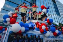 The Summerlin South baseball team makes their way down a road during a parade in honor of their ...