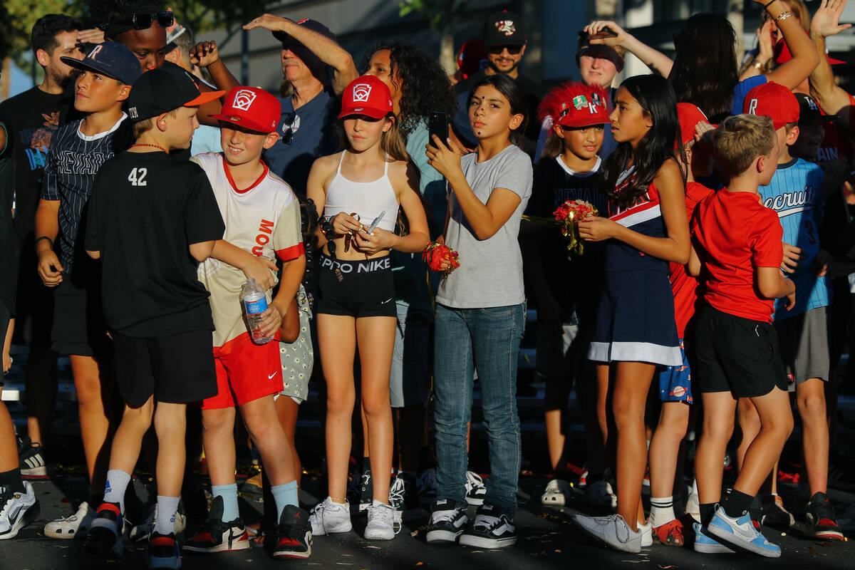 The crowd disperses after a celebratory parade for the Summerlin South Little League team, now ...