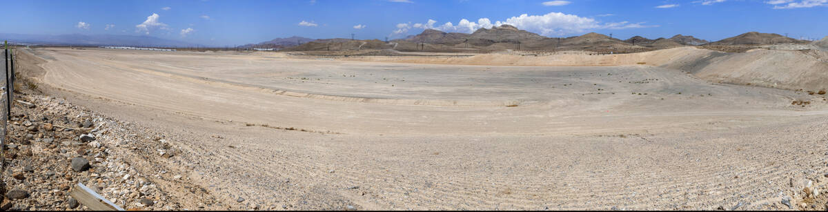 A stitched panoramic image of a large parcel of land in Apex Industrial Park that recently sold ...