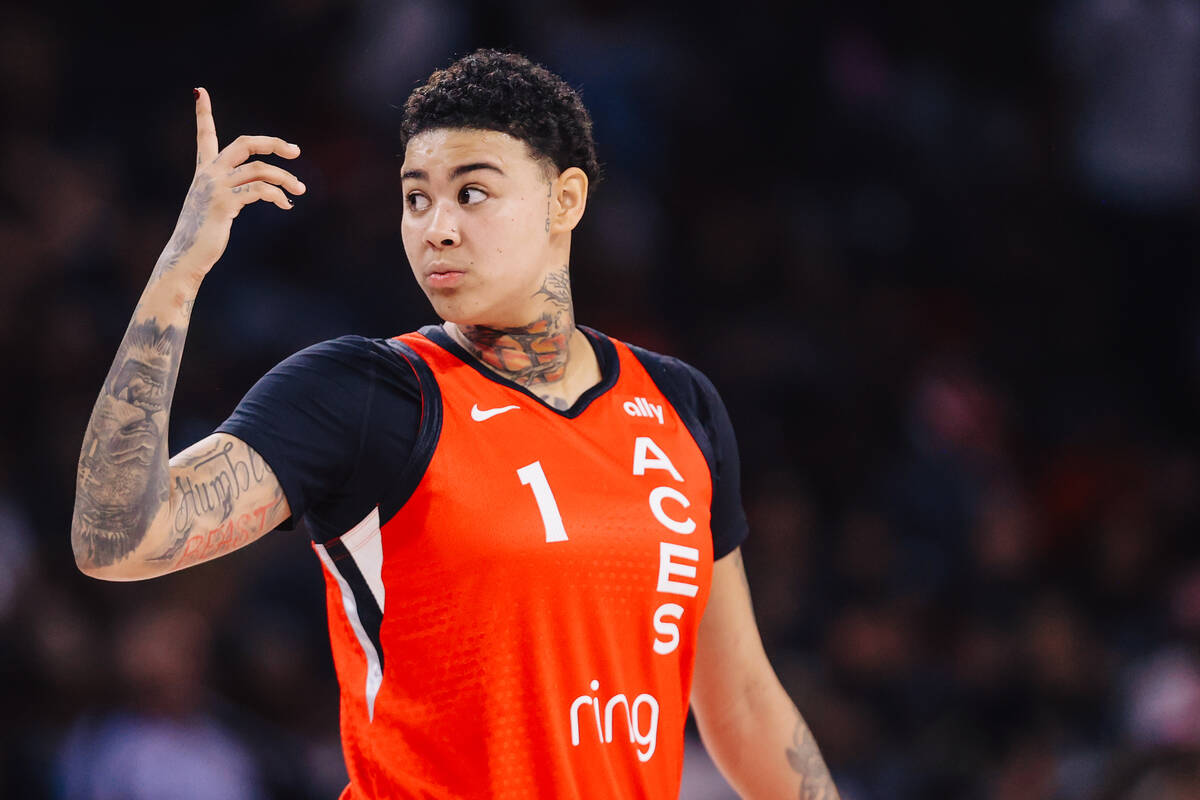 Aces forward Kierstan Bell signals to a teammate during a WNBA basketball game between the Aces ...