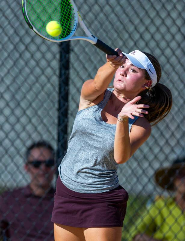 Faith Lutheran's Adrielle Jones connects on a return ball against Bishop Gorman during their si ...