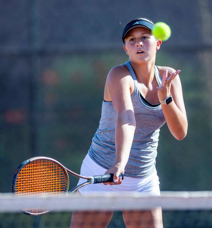 Bishop Gorman's Allie Miller eyes a returned ball against Faith Lutheran during their doubles N ...