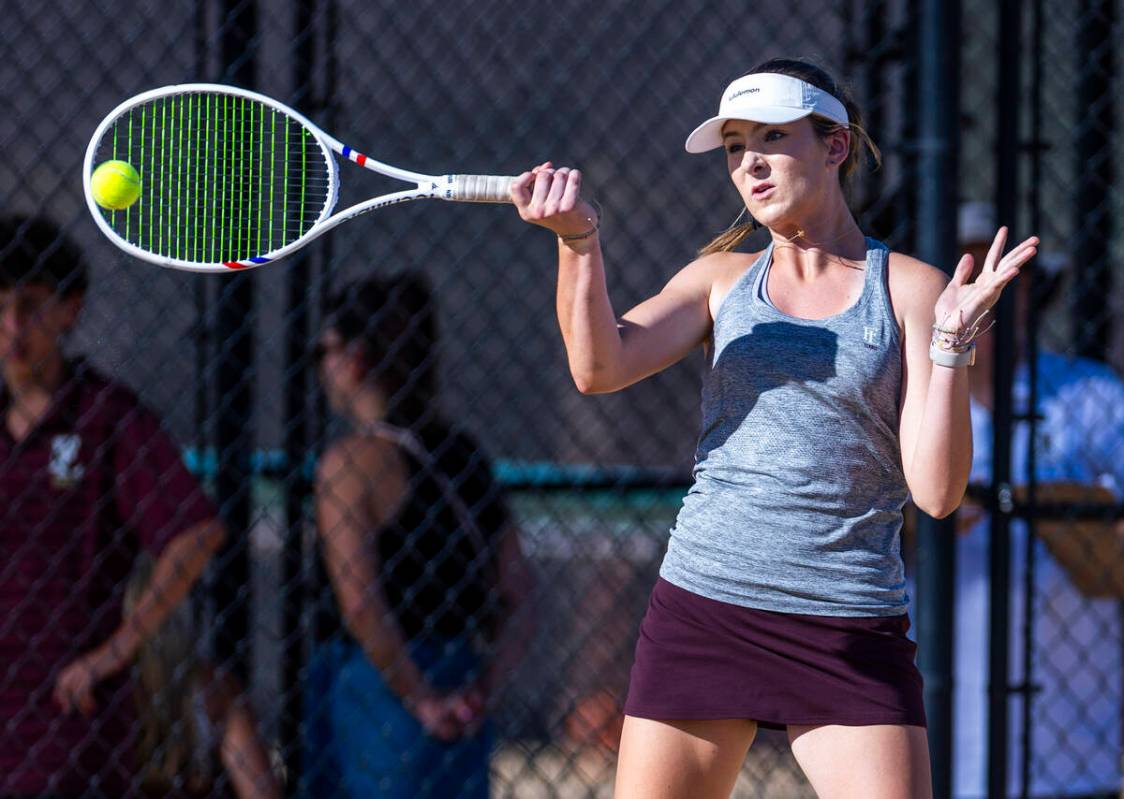 Faith Lutheran's Ella Vreeling returns a ball against Bishop Gorman during their doubles NIAA t ...