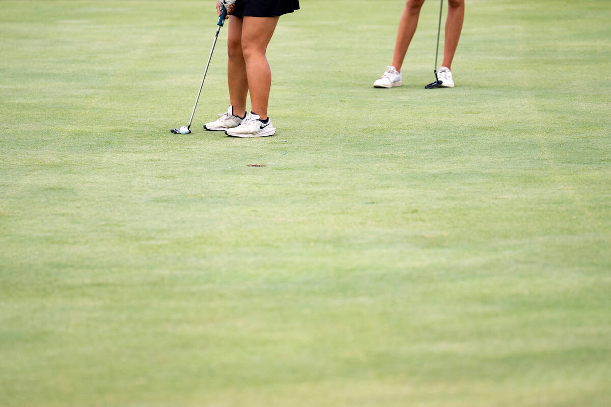 Clark’s Emma Allen attempts to putt the ball during a Class 5A Desert League girls golf ...
