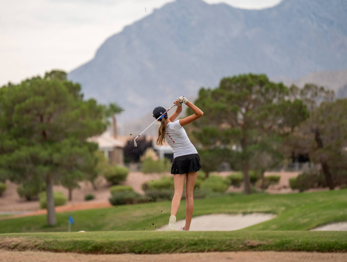 Ellie Prosser tees off during a Class 5A Desert League girls golf match at Highland Falls Golf ...