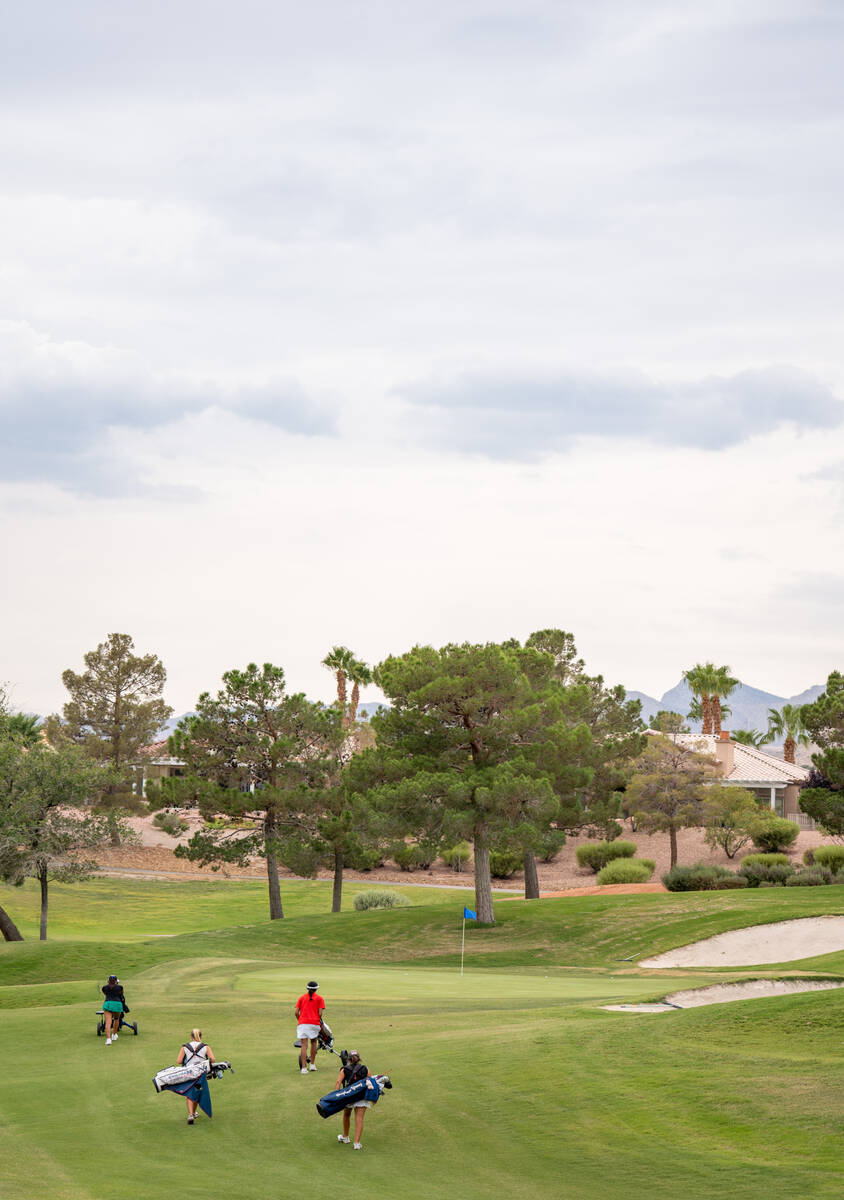 The third group of golfers moves to the next hole during a Class 5A Desert League girls golf ma ...