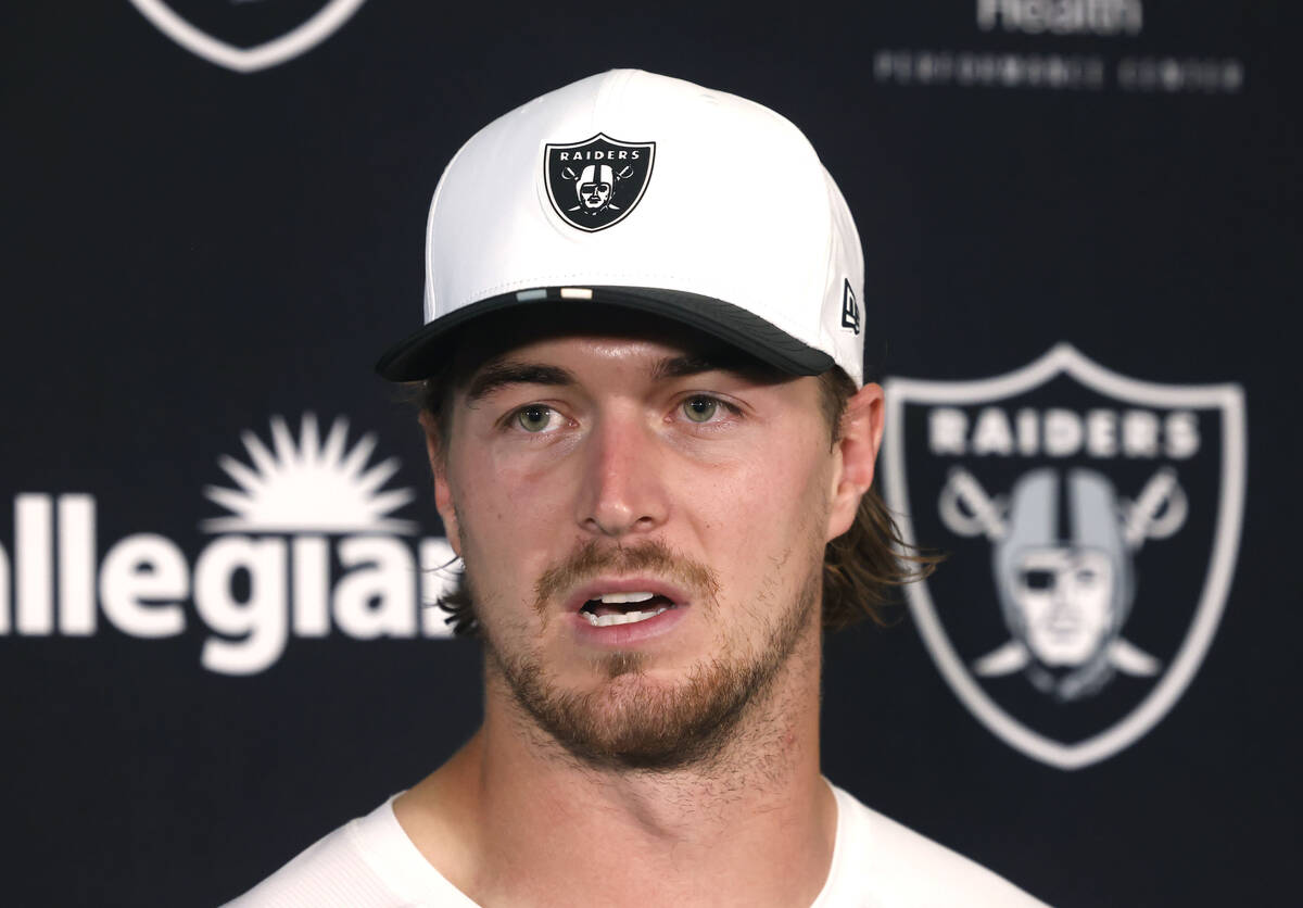 Raiders backup quarterback Kenny Pickett answers reporter questions after team practice at the ...