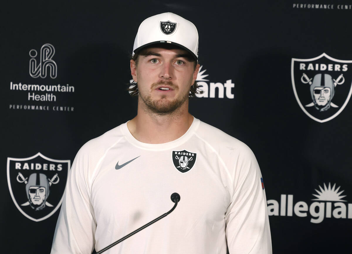 Raiders backup quarterback Kenny Pickett answers reporter questions after team practice at the ...