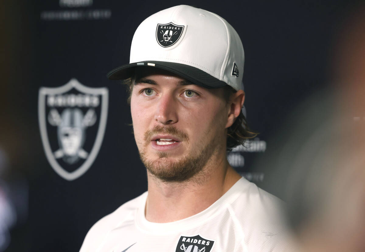 Raiders backup quarterback Kenny Pickett answers reporter questions after team practice at the ...