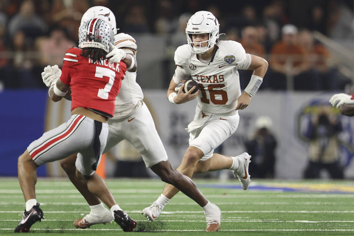 Texas quarterback Arch Manning (16) runs against Ohio State during the first half of the Cotton ...