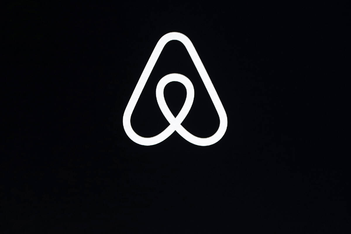 This photo shows an Airbnb logo. (AP Photo/Eric Risberg, File)