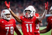 UNLV wide receiver Ricky White III (11) celebrates after scoring a touchdown during the college ...